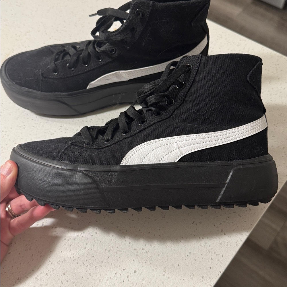 High top platform Puma Sneakers. Minimal staining on left outside shoe. - Picture 2 of 3